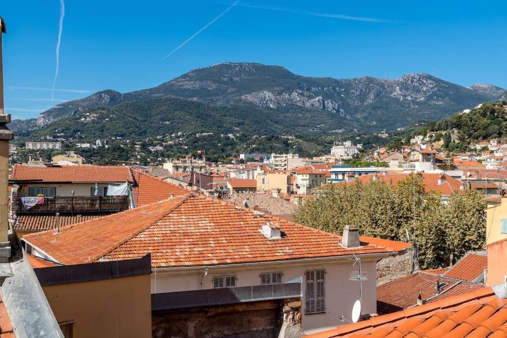 Between The Roofs Of Menton Old Town And The Sea Bagian luar foto